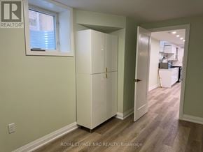 Thorold (Rolling Meadows) apartment for rent - A white cabinet with a window above it in a room.