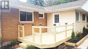 Newmarket (Huron Heights-Leslie Valley) apartment for rent - A wooden deck in front of a house.