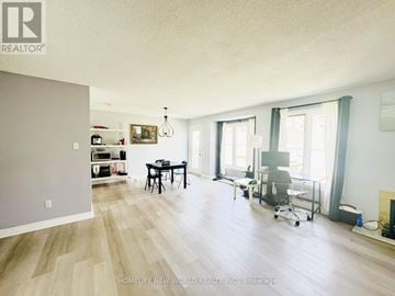 London North (North G) townhouse for rent - A living room with a dining table and chairs.