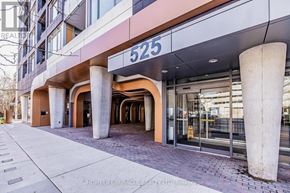 Toronto (Waterfront Communities) condo for rent - The image shows a building entrance with a sign that reads "525" and is part of the Homelife/Miracle Realty LTD brokerage.