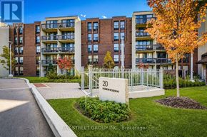 Toronto (Willowdale East) condo for rent - A street view of a residential area with apartment buildings and a sign that reads "20 BAY STREET GROUP INC. Brokerage".