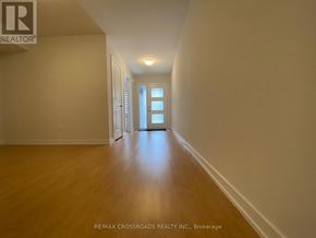 Markham (Cornell) townhouse for rent - A long hallway with a door at the end.