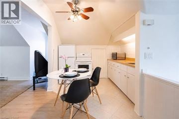 Hamilton apartment for rent - A modern kitchen with a dining table and chairs.