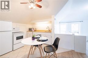 Hamilton apartment for rent - A modern kitchen with a table and chairs.