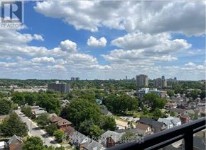 Waterloo condo for rent - A view of a residential area from a balcony.