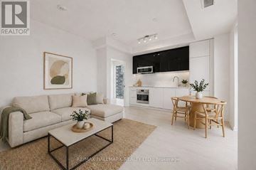 Toronto (Church-Yonge Corridor) condo for rent - A living room with a couch, coffee table, and a painting on the wall.