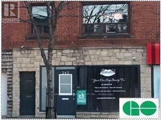 Mississauga (Port Credit) apartment for rent - A building with a sign that says "You're One Day Away To" on it.