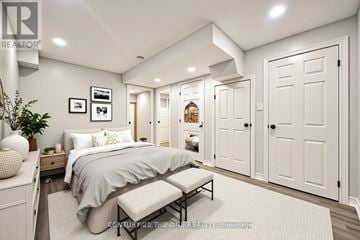 Toronto (Tam O'shanter-Sullivan) apartment for rent - A bedroom with a bed, nightstand, and a plant.