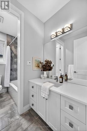 London North (North R) apartment for rent - A bathroom with a white sink and a white towel.