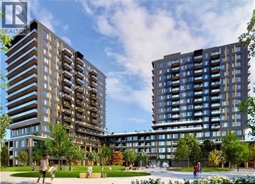 Burlington condo for rent - Two modern apartment buildings with balconies and a park in front.