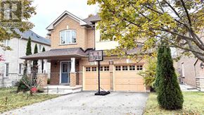 Richmond Hill (Westbrook) apartment for rent - A house with a basketball hoop in front.