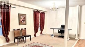 Richmond Hill (Westbrook) apartment for rent - A room with a table, chairs and a painting on the wall.