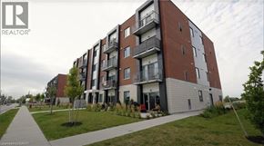 Ayr apartment for rent - A modern apartment building with balconies and a walkway in front.