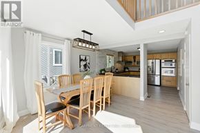 Blue Mountains apartment for rent - A modern kitchen with a dining table and chairs.