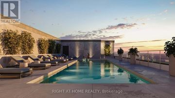 Ottawa condo for rent - A pool area with lounge chairs and a building in the background.