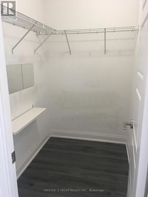 Markham (Unionville) condo for rent - A white closet with a shelf and a metal rack.