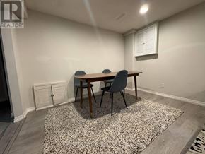 Richmond Hill (North Richvale) apartment for rent - A dining room with a table and chairs.