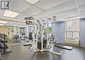 Oshawa (O'neill) condo for rent - A well-equipped gym with various exercise machines.
