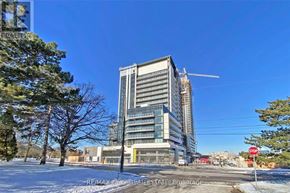 Toronto (Banbury-Don Mills) condo for rent - A large building with a crane on top is under construction.