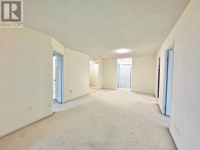 Toronto (Newtonbrook East) condo for rent - A room with a window and carpeted floor.