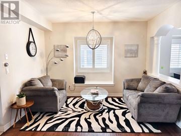 Oakville (Jc Joshua Creek) apartment for rent - A living room with a zebra rug and grey couches.