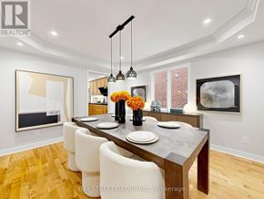 Aurora (Aurora Highlands) apartment for rent - A dining room with a wooden table and chairs.