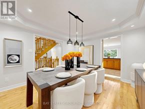 Aurora (Aurora Highlands) apartment for rent - A dining room with a wooden table and chairs.
