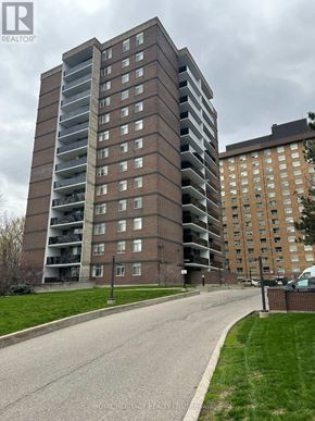 Toronto (Woburn) condo for rent - A tall residential building with a balcony on the 10th floor.