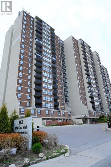 Toronto (Islington-City Centre West) condo for rent - A tall residential building with a sign that reads "362 The East Wall".