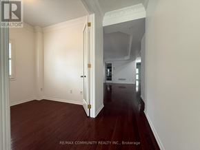 Oshawa (Taunton) apartment for rent - A room with a doorway leading to another room.