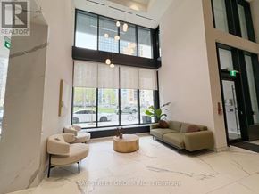 Toronto (Church-Yonge Corridor) condo for rent - A modern waiting area with a view of the street outside.