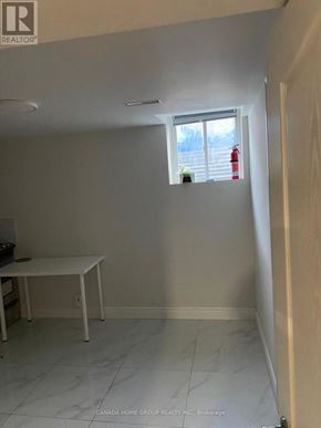 Toronto (Agincourt North) apartment for rent - A room with a table and a window.