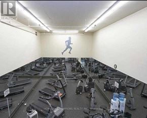 Toronto (Pleasant View) condo for rent - A gym with treadmills and exercise equipment.