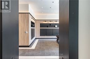 Hamilton (Beasley) condo for rent - A brokerage office with a wooden door and a black wall.