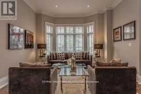 Toronto (Bedford Park-Nortown) apartment for rent - A living room with a glass coffee table and a sofa.