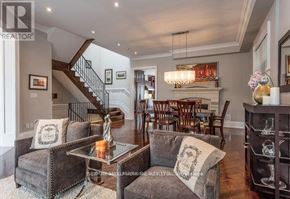 Toronto (Bedford Park-Nortown) apartment for rent - A living room with a grey couch and a glass coffee table.