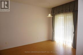Markham (Unionville) townhouse for rent - A room with a window covered by a curtain.