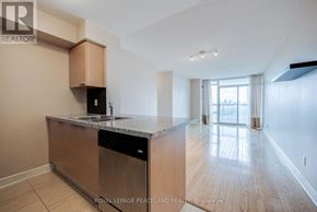 Toronto (Willowdale East) condo for rent - A kitchen with a sink and a dishwasher.