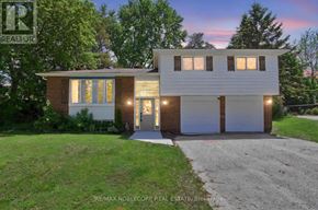 Essa (Angus) apartment for rent - A modern two-story house with a garage is shown in the image.