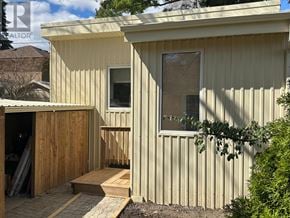 Toronto (Lambton Baby Point) apartment for rent - A small building with a wooden door and a window.