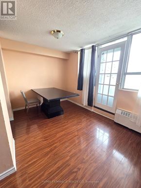 Toronto (Dorset Park) condo for rent - A room with a table and chairs in it.