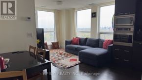 Toronto (Willowdale East) condo for rent - A living room with a couch, chairs, and a table.