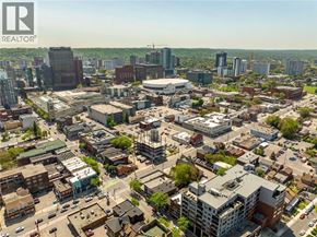 Hamilton apartment for rent - A cityscape with a mix of residential and commercial buildings.
