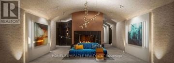 Hamilton (Lakeshore) condo for rent - A modern living room with a fireplace and a large painting on the wall.