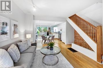 Toronto (Yonge-Eglinton) apartment for rent - A living room with a grey couch and a glass table.