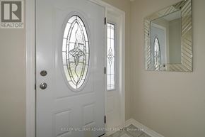 Toronto (Wexford-Maryvale) apartment for rent - A white door with a glass window is in a hallway.