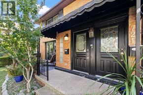 Windsor apartment for rent - A house numbered 721 with a black front door and a small porch.
