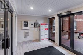 St. John's house for rent - A modern house entrance with a glass door and a black mat.