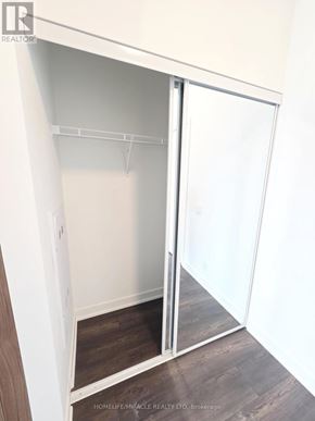 Toronto (Clairlea-Birchmount) condo for rent - A white closet with a sliding door is open.