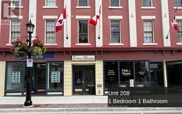 Port Hope apartment for rent - A building with a sign that says Waltonview on it.